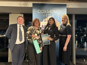 Cherryl Brown from Cruise World won Jacquart champagne and Crystal Grace coffee table book with Cox & Kings’ George Colvin-Slee on (left) and AKTG’s Anoushka Kudav and Susan Haberle (right).