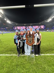 June Thomas from HCB Travel, Williment Travel’s Leeann Martin, Sharon Rapsey from House of Travel Events, Destination NSW’s Melissa Brooks, Dean Josephs from Fortis Travel, Pukekohe Travel’s Andrea Watkin and Jessica Kilbride-Parris from Qantas at Accor Stadium.