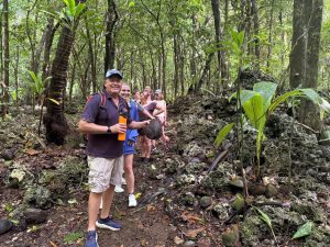 Niue Tourism’s Hayden Porter leads a guided hike.