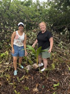 HoT’s Kelly Gainsford and Renee Lomas of Shore Travel planting a coconut palm.